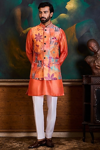 Peach & Coral Poly Dupion Printed Bundi Jacket Set by NITIKA GUJRAL MEN