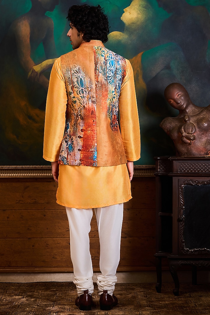 Mustard & Orange Poly Dupion Printed Bundi Jacket Set by NITIKA GUJRAL MEN at Pernia's Pop Up Shop