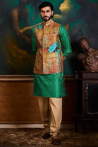 Rust & Emerald Green Poly Dupion Printed Bundi Jacket Set by NITIKA GUJRAL MEN