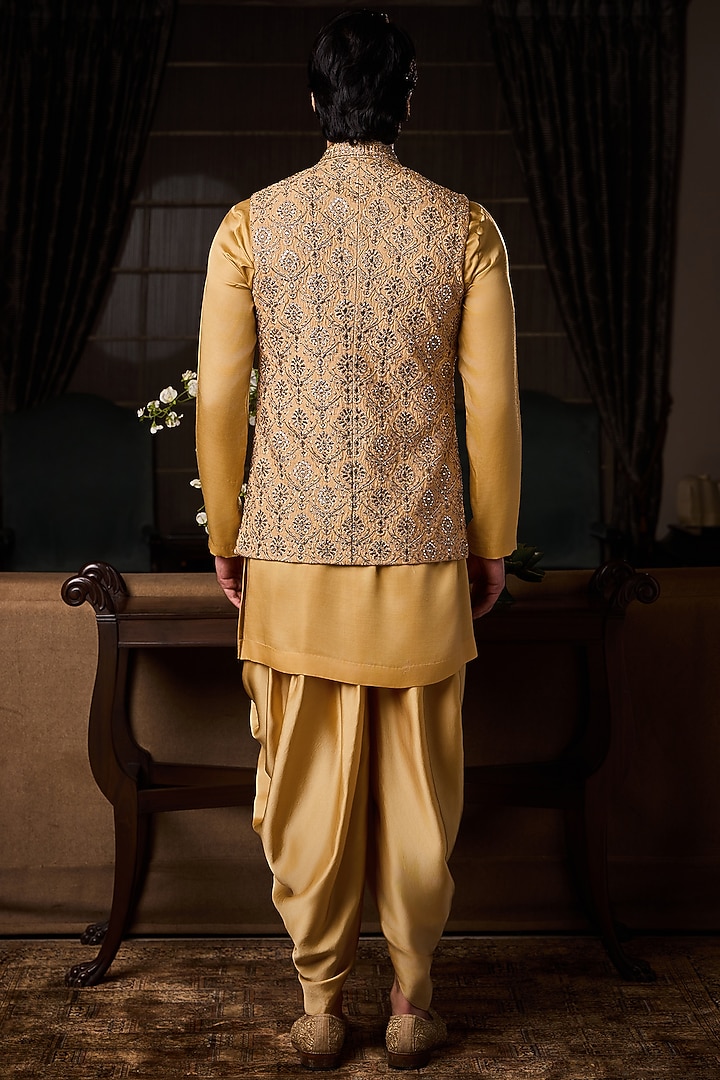 Gold Raw Silk Sequins Embroidered Bundi Jacket Set by NITIKA GUJRAL MEN at Pernia's Pop Up Shop