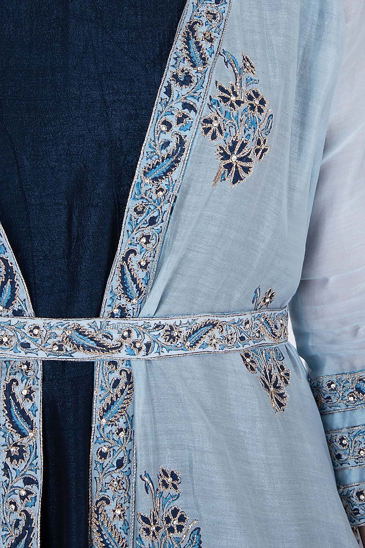 Navy blue embroidered anarkali gown with ice blue jacket and belt available only at Pernia's Pop Up Shop.