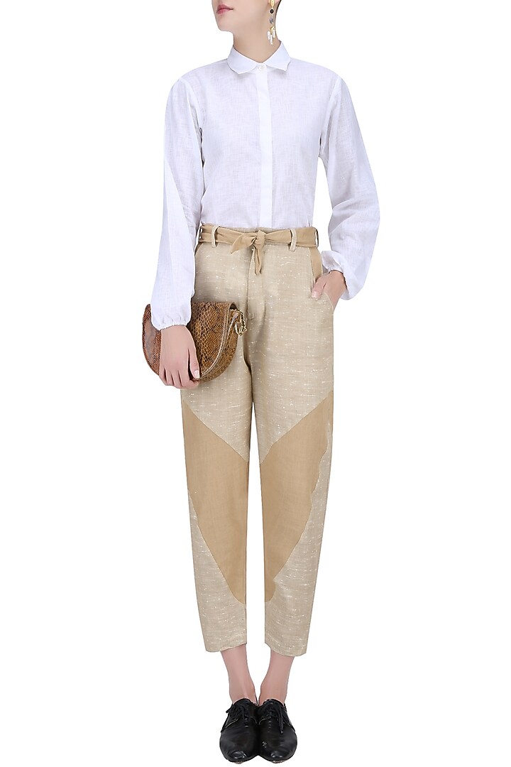 Beige and brown patchwork knee cutouts pants available only at Pernia's Pop Up Shop.