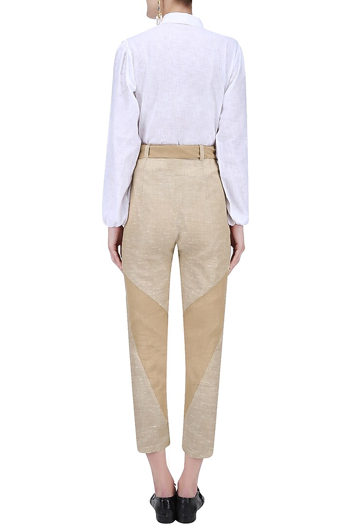 Beige and brown patchwork knee cutouts pants available only at Pernia's Pop Up Shop.