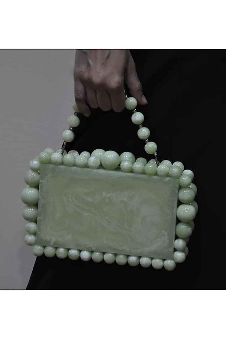 Pista Green Resin Embellished Sling Bag by HANDLE THOSE BAGS at Pernia's Pop Up Shop
