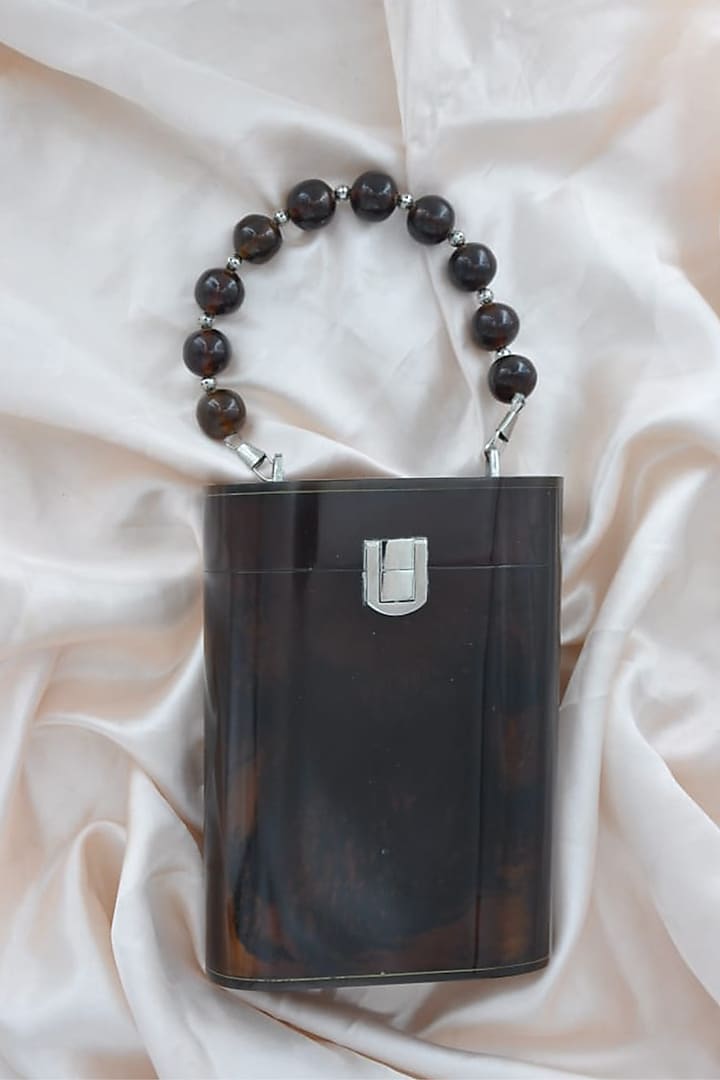 Black & Rust Resin Cylindrical Clutch by HANDLE THOSE BAGS