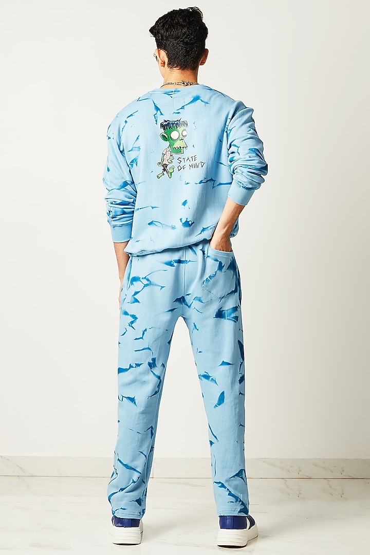 Sky Blue Printed Jogger Pants by HUEDEE at Pernia's Pop Up Shop