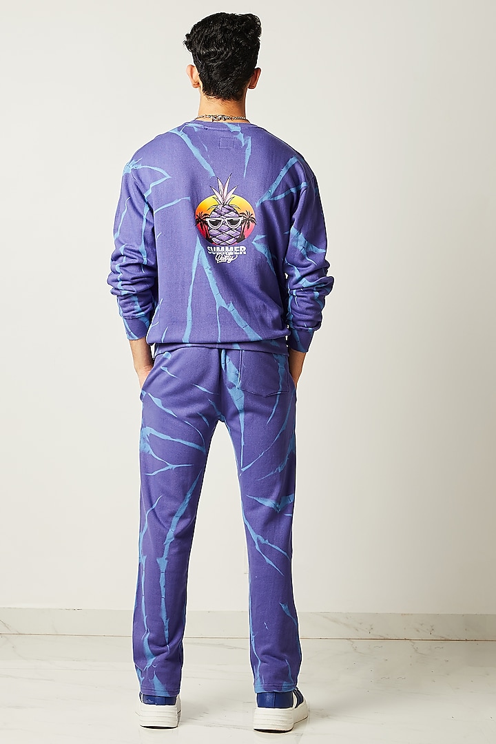 Purple Printed Jogger Pants by HUEDEE at Pernia's Pop Up Shop
