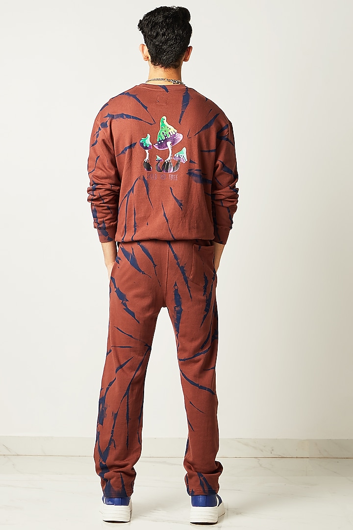 Brown Printed Jogger Pants by HUEDEE at Pernia's Pop Up Shop