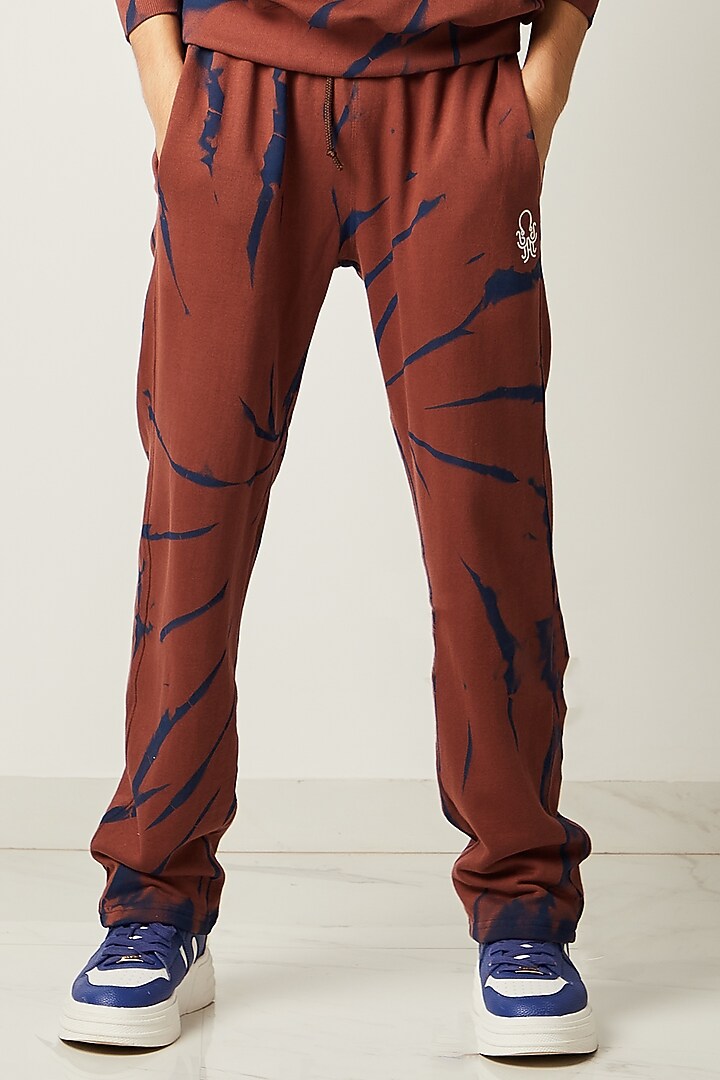 Brown Printed Jogger Pants by HUEDEE at Pernia's Pop Up Shop