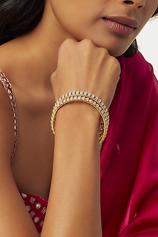 Gold Finish Moissanite Polki Bangles In Sterling Silver (Set of 2) by Hunar