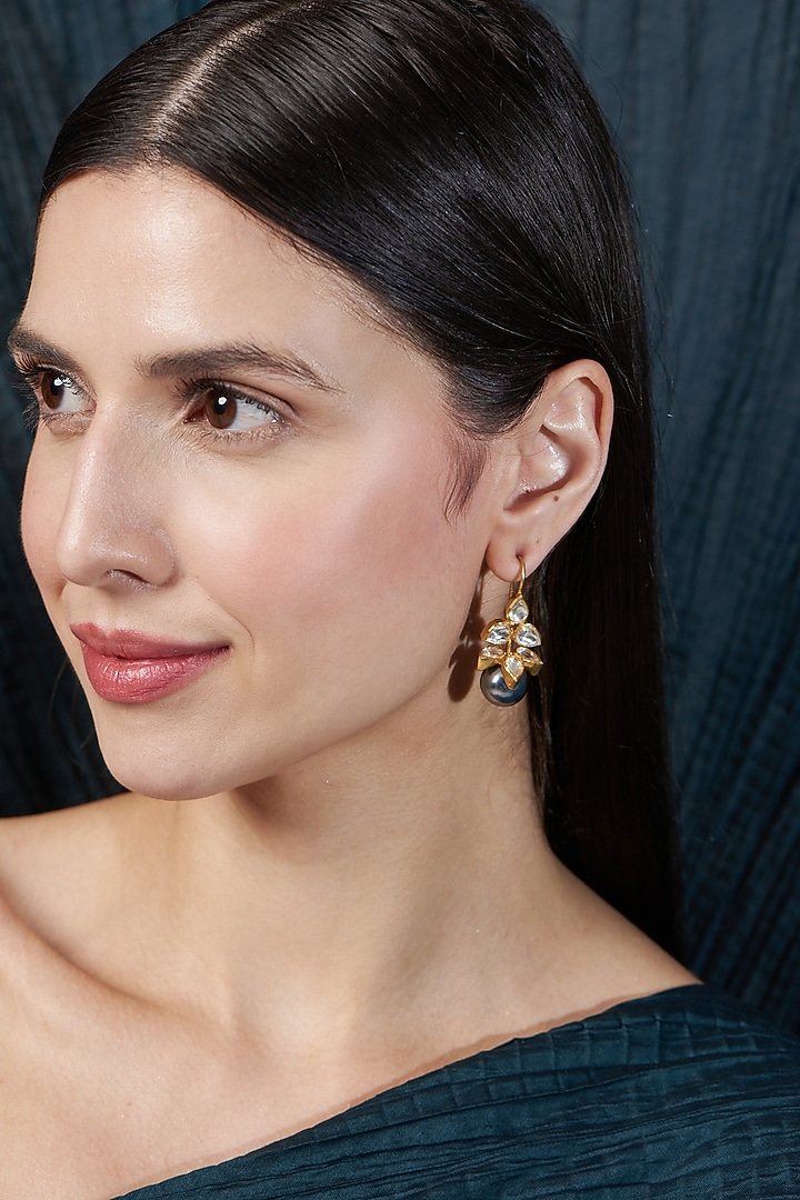 Gold Finish Moissanite Kundan Polki Stud Earrings In Sterling Silver by Hunar at Pernia's Pop Up Shop