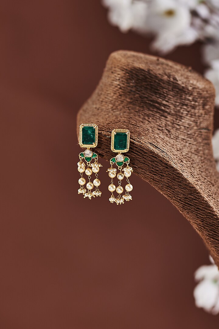 Gold Finish Moissanite & Emerald Stone Dangler Earrings In Sterling Silver by Hunar at Pernia's Pop Up Shop