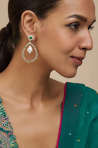 Gold Finish Moissanite Polki & Green Stone Dangler Earrings In Sterling Silver by Hunar