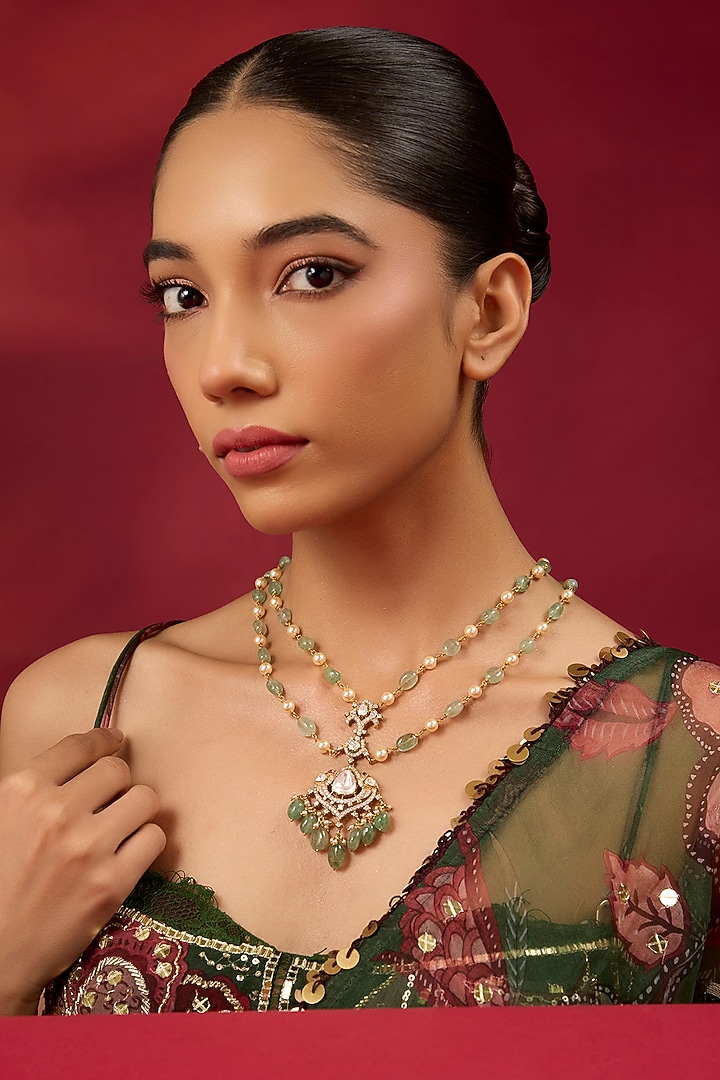 Gold Finish Emerald Stone Layered Necklace In Sterling Silver by Hunar at Pernia's Pop Up Shop