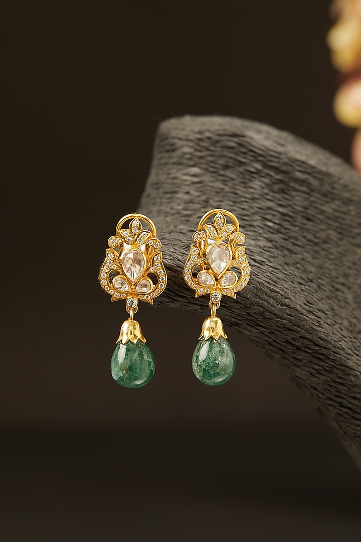 Gold Finish Emerald Synthetic Stone Stud Earrings In Sterling Silver by Hunar at Pernia's Pop Up Shop