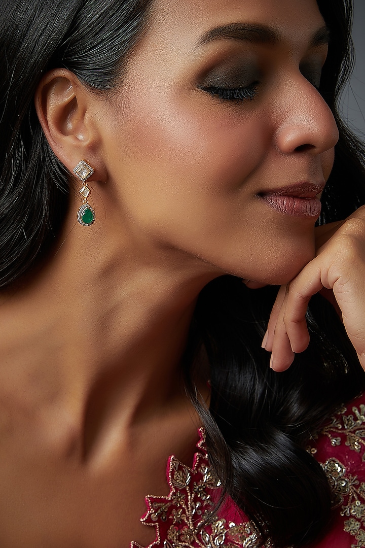 Gold Finish Moissanite Polki & Emerald Synthetic Stone Dangler Earrings In Sterling Silver by Hunar at Pernia's Pop Up Shop