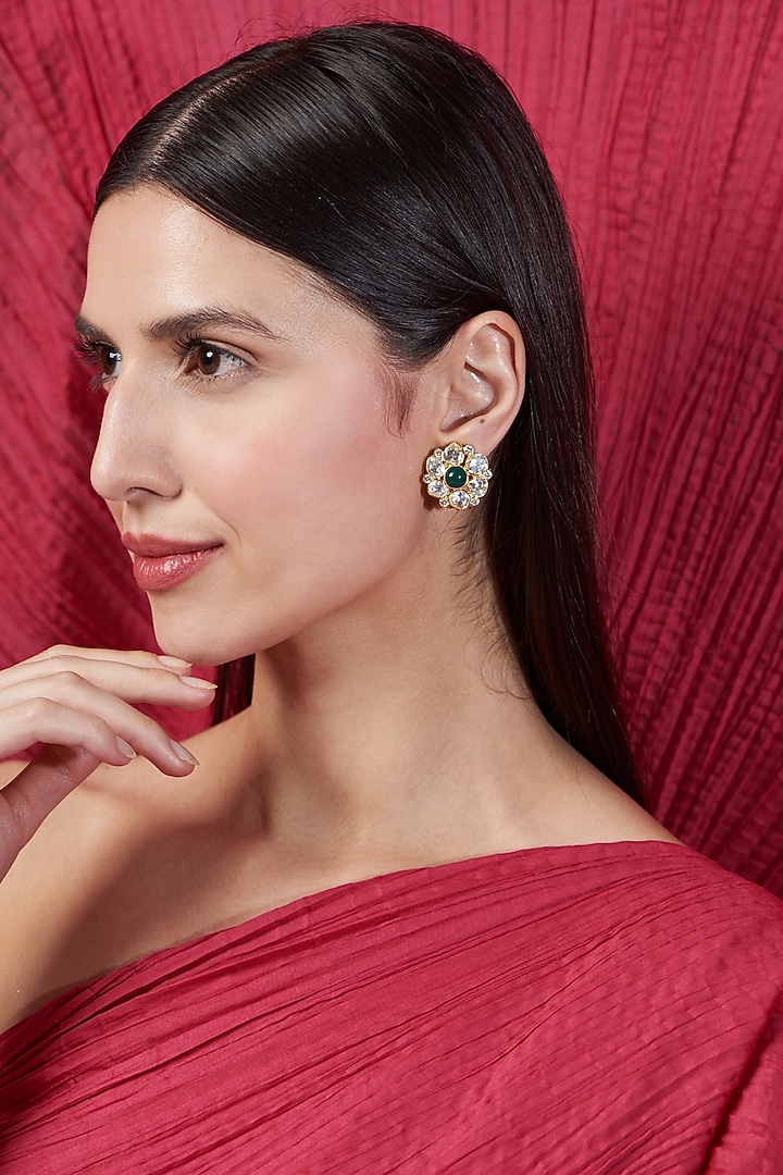 Gold Finish Moissanite & Emerald Synthetic Stone Stud Earrings In Sterling Silver by Hunar at Pernia's Pop Up Shop