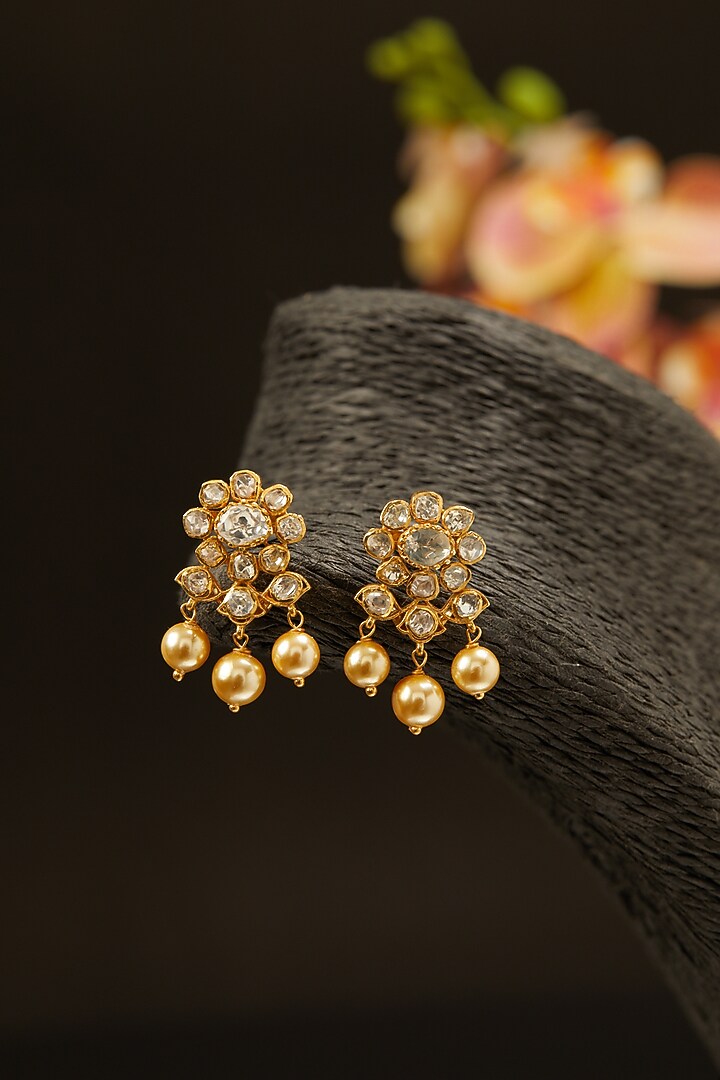 Gold Finish Moissanite Kundan Polki Stud Earrings In Sterling Silver by Hunar at Pernia's Pop Up Shop