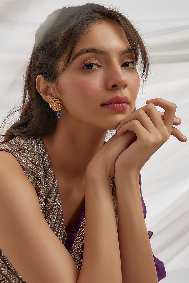 Gold Finish Moissanite Polki & Blue Stone Stud Earrings In Sterling Silver by Hunar at Pernia's Pop Up Shop