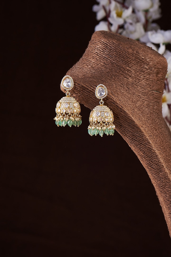 Gold Finish Moissanite Polki & Emerald Stone Jhumka Earrings In Sterling Silver by Hunar at Pernia's Pop Up Shop