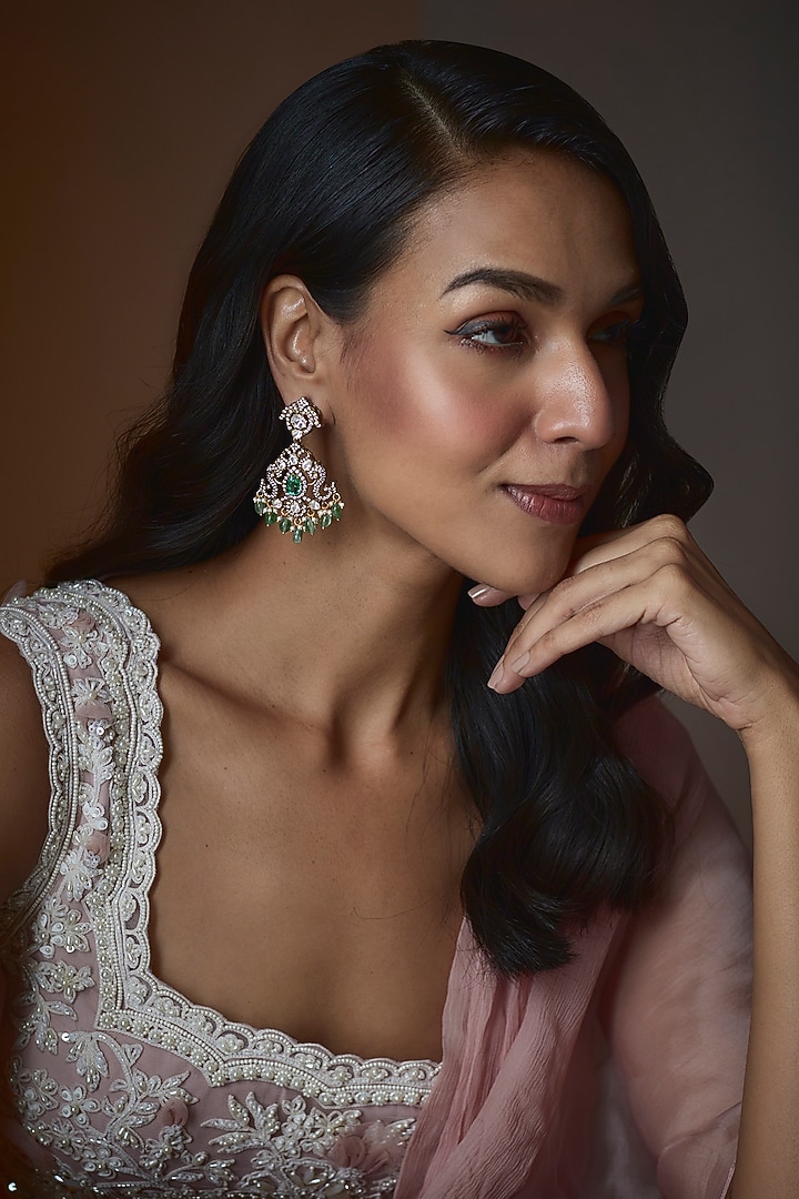 Gold Finish Moissanite Polki & Synthetic Emerald Stud Earrings In Sterling Silver by Hunar at Pernia's Pop Up Shop