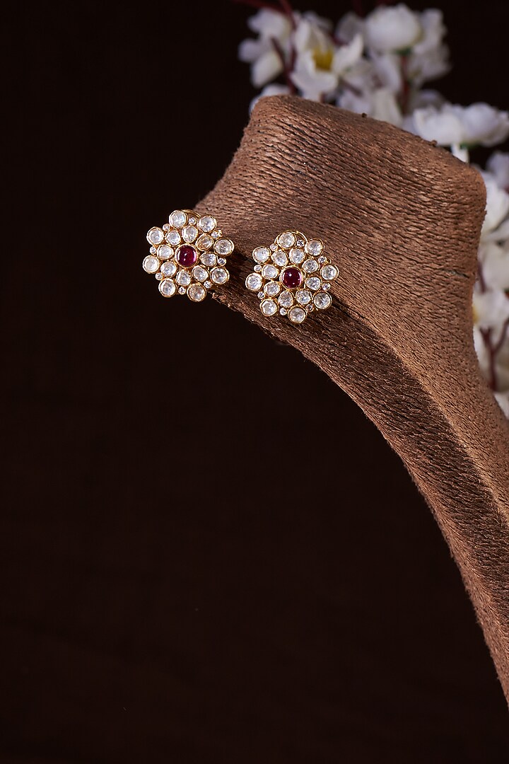 Gold Finish Moissanite Polki & Synthetic Ruby Stud Earrings In Sterling Silver by Hunar at Pernia's Pop Up Shop