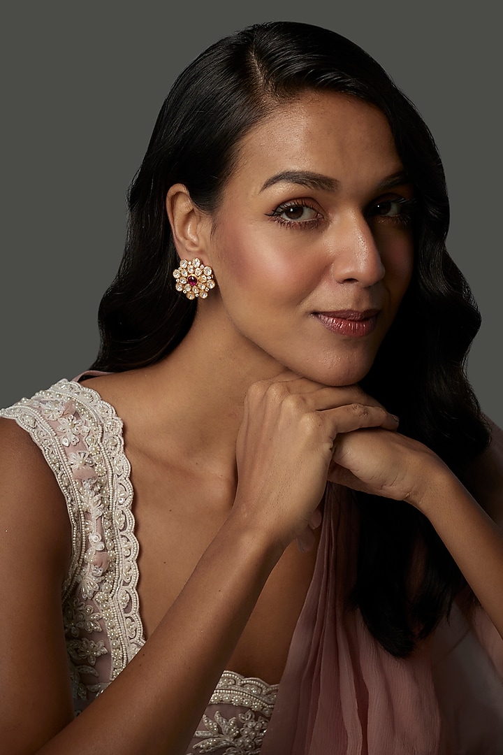 Gold Finish Moissanite Polki & Synthetic Ruby Stud Earrings In Sterling Silver by Hunar at Pernia's Pop Up Shop