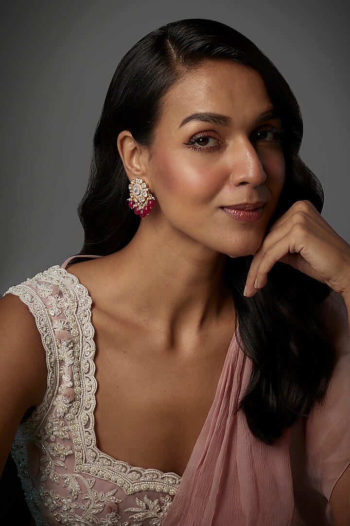 Gold Finish Moissanite Polki & Red Stone Stud Earrings In Sterling Silver by Hunar at Pernia's Pop Up Shop