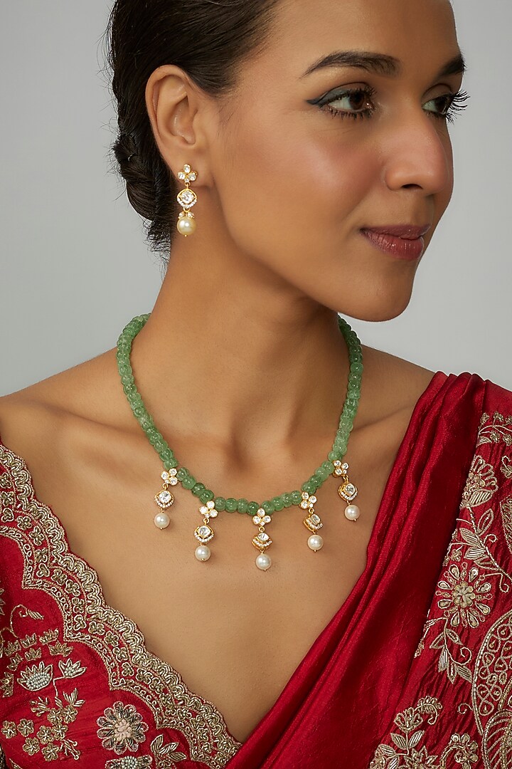 Gold Finish Moissanite Polki & Green Stone Long Necklace Set In Sterling Silver by Hunar at Pernia's Pop Up Shop