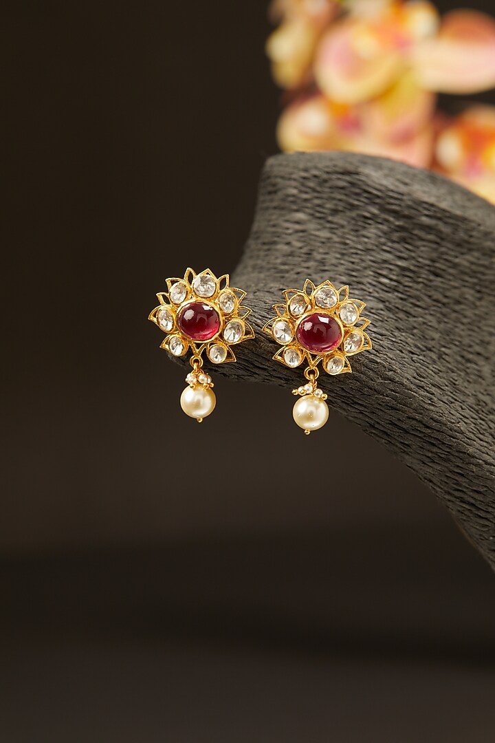 Gold Finish Moissanite & Ruby Synthetic Stones Stud Earrings In Sterling Silver by Hunar at Pernia's Pop Up Shop