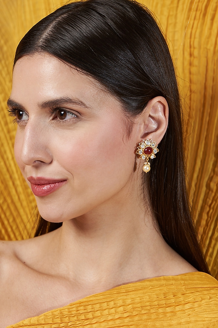 Gold Finish Moissanite & Ruby Synthetic Stones Stud Earrings In Sterling Silver by Hunar at Pernia's Pop Up Shop