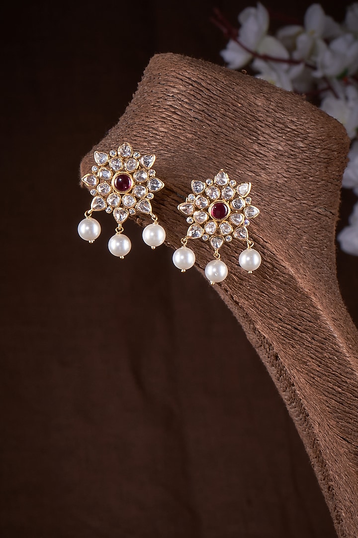 Gold Finish Moissanite Polki & Red Stone Stud Earrings In Sterling Silver by Hunar at Pernia's Pop Up Shop