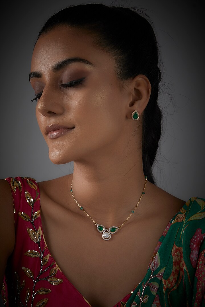 Gold Finish Moissanite Polki & Green Synthetic Stone Necklace Set In Sterling Silver by Hunar at Pernia's Pop Up Shop