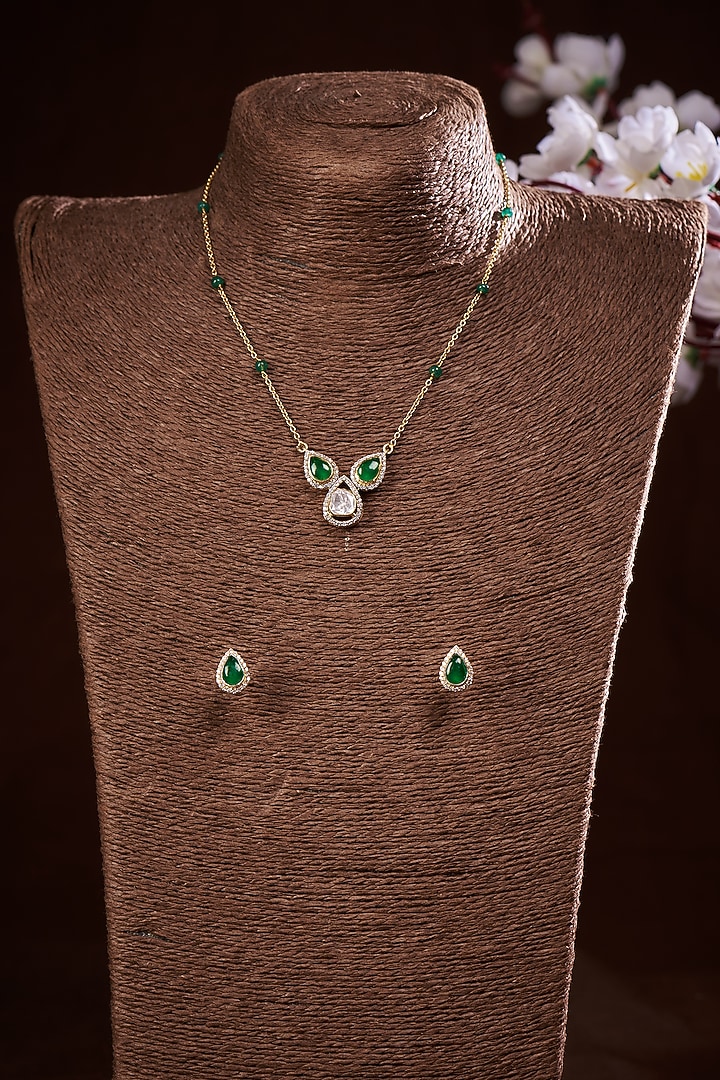 Gold Finish Moissanite Polki & Green Synthetic Stone Necklace Set In Sterling Silver by Hunar at Pernia's Pop Up Shop
