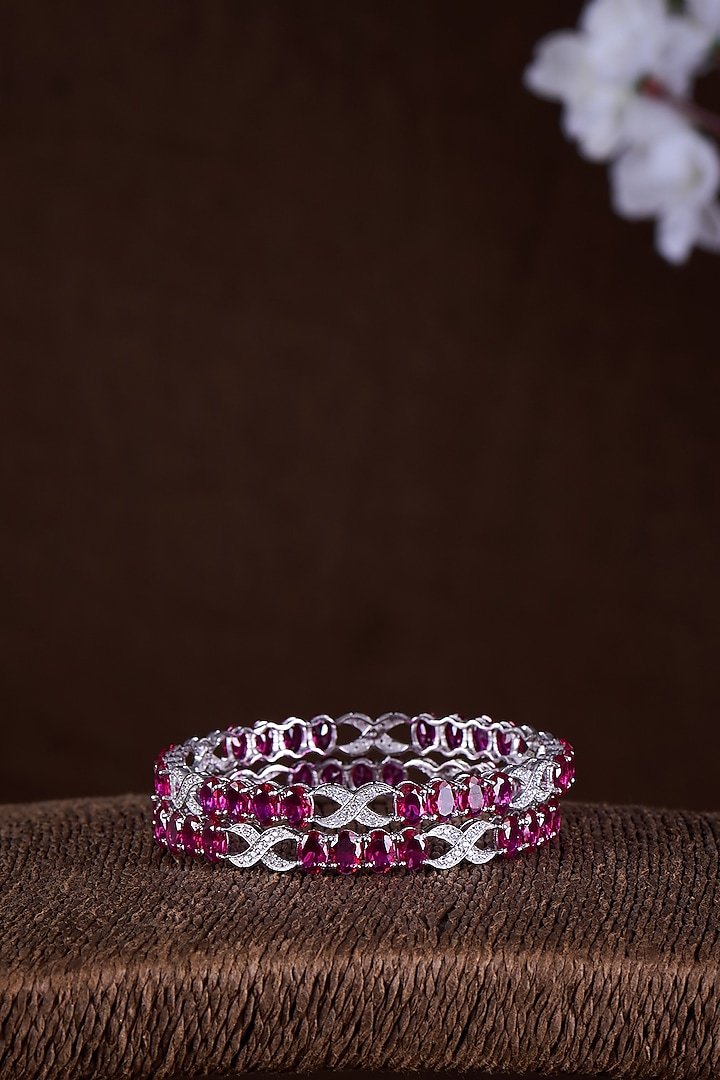 Gold Finish Moissanite Polki & Red Stone Bangles In Sterling Silver (Set Of 2) by Hunar at Pernia's Pop Up Shop