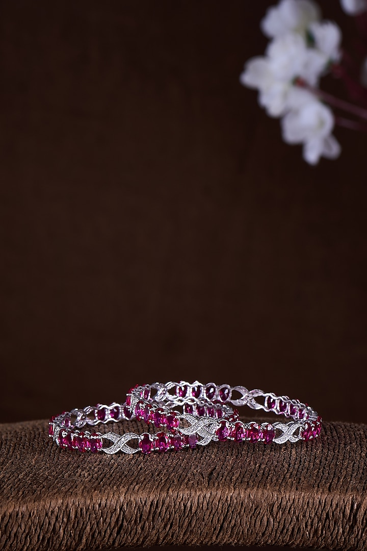 Gold Finish Moissanite Polki & Red Stone Bangles In Sterling Silver (Set Of 2) by Hunar at Pernia's Pop Up Shop