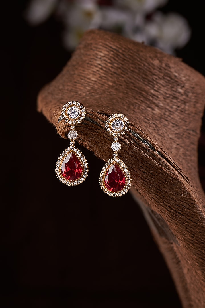 Gold Finish Moissanite Polki & Red Stone Dangler Earrings In Sterling Silver by Hunar at Pernia's Pop Up Shop