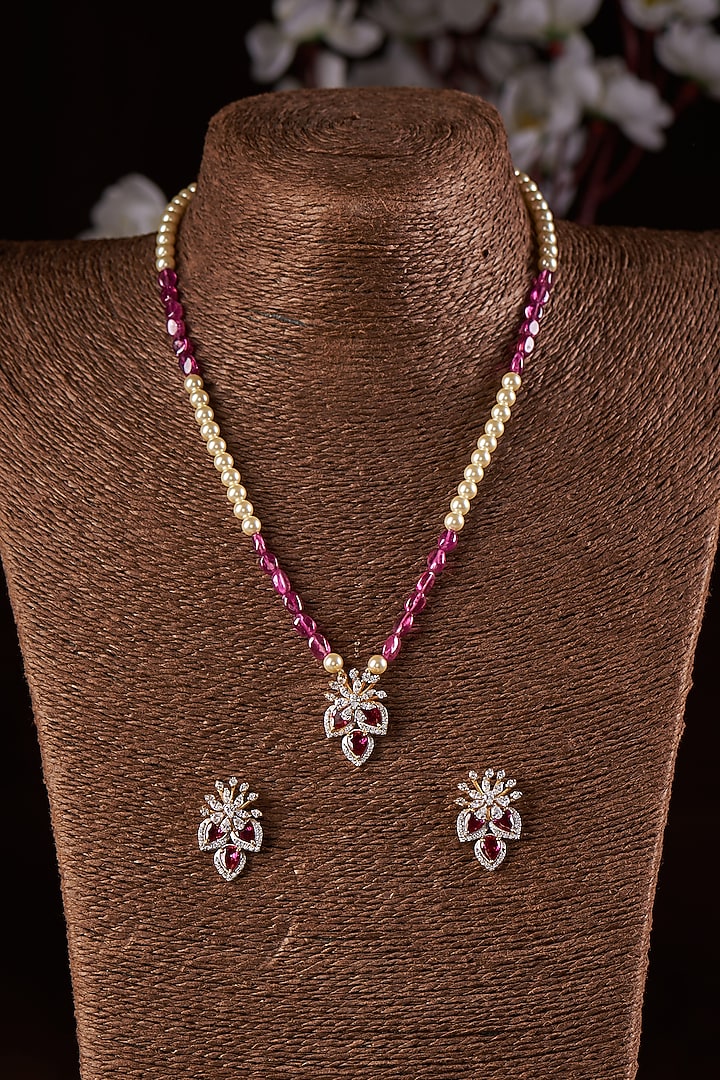 Gold Finish Moissanite Polki & Synthetic Red Stone Necklace Set In Sterling Silver by Hunar at Pernia's Pop Up Shop