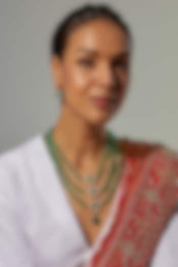 Gold Finish Moissanite Polki & Green Stone Layered Necklace Set In Sterling Silver by Hunar at Pernia's Pop Up Shop