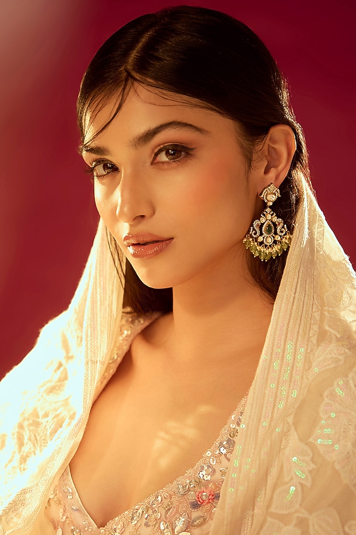 Gold Finish Moissanite Polki & Synthetic Emerald Stud Earrings In Sterling Silver by Hunar at Pernia's Pop Up Shop