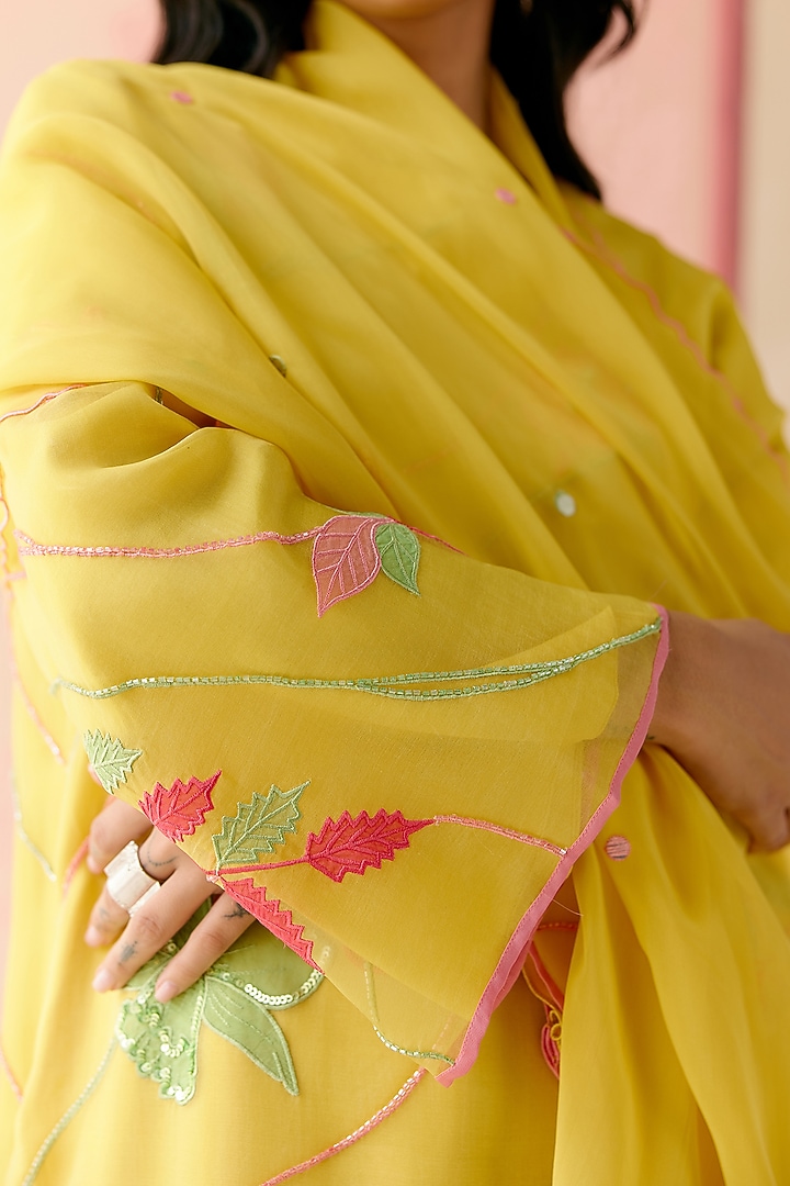 Mustard Silk Organza Floral Applique Work Kurta Set by I AM DESIGN at Pernia's Pop Up Shop