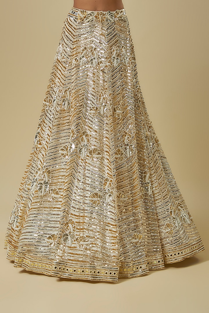 Ivory Gold Silk Shantoon & Hard Net Cape Bridal Lehenga Set by I AM DESIGN at Pernia's Pop Up Shop