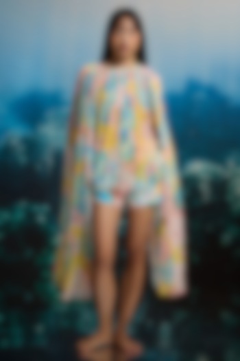 Yellow Slub Texture & Viscose Floral Printed Shorts by THE IASO at Pernia's Pop Up Shop