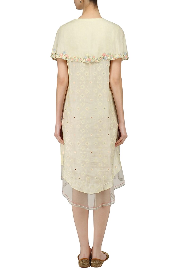 Ivory floral layered cape style dress available only at Pernia's Pop Up Shop.