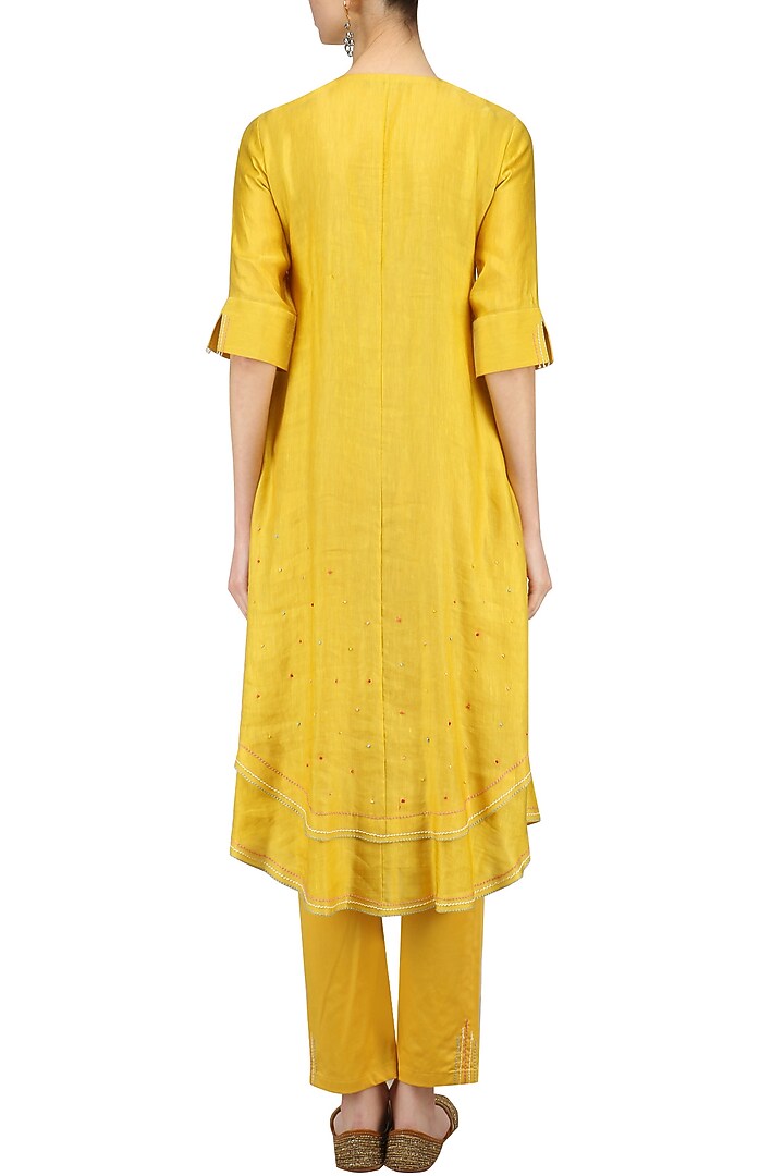 Mustard hand embroidered layered kurta and pants set available only at Pernia's Pop Up Shop.