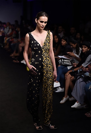 Black and mustard patola printed jumpsuit by I AM DESIGN