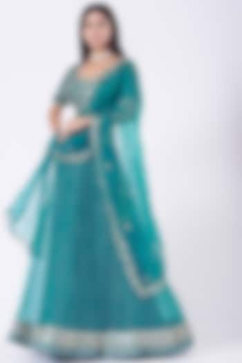 Turquoise Embroidered Lehenga Set by Ivory by dipika