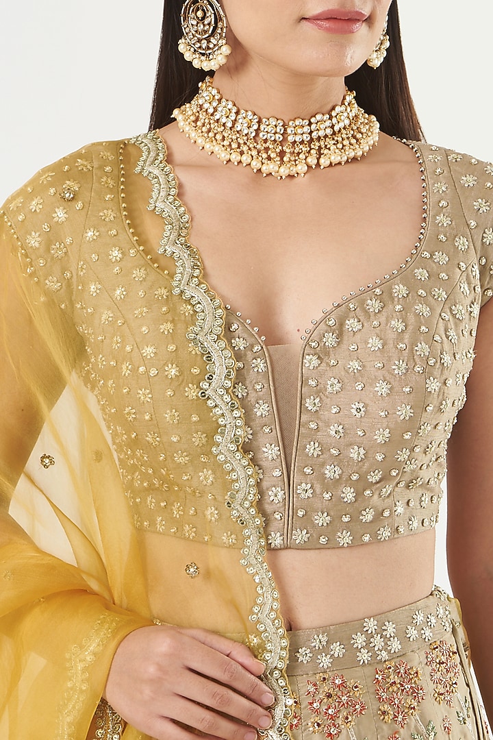 Beige Embroidered Wedding Lehenga Set by Ivory by dipika at Pernia's Pop Up Shop