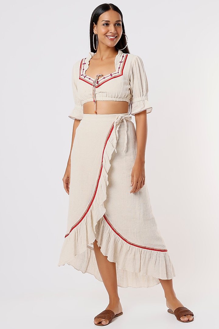 Off-White Embroidered Overlap Skirt by IKSANA
