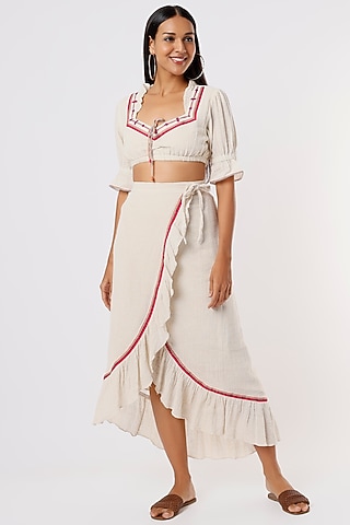 Off-White Embroidered Overlap Skirt by IKSANA